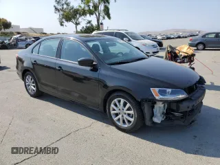 2015 Volkswagen Jetta SE with VIN 3VWD17AJ2FM314637, listed as a Copart auction lot 59715185 with 181,247 mi miles and Salvage title. Bid and sale history available at DreamBid. Image 4.