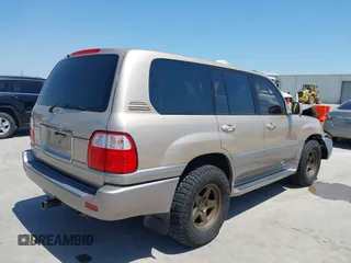 2000 Lexus LX 470 z VIN JT6HT00W4Y0114729, wystawiony jako IAAI lot #42227081 z przebiegiem 129 117 mil mil oraz . Historia ofert i sprzedaży dostępna na DreamBid. Obrazek 4.