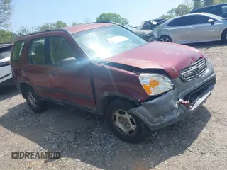 2002 Honda CR-V LX with VIN JHLRD68442C005924, listed as a IAAI auction lot 42019526 with 173,111 mi miles and . Bid and sale history available at carsss.com. Image 1.