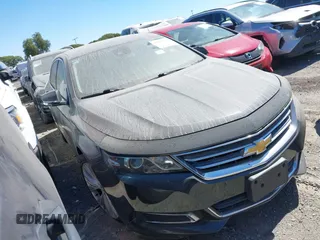 2014 Chevrolet Impala LT with VIN 1G1125S30EU118979, listed as a IAAI auction lot 40084364 with 145,015 mi miles and . Bid and sale history available at DreamBid. Image 1.