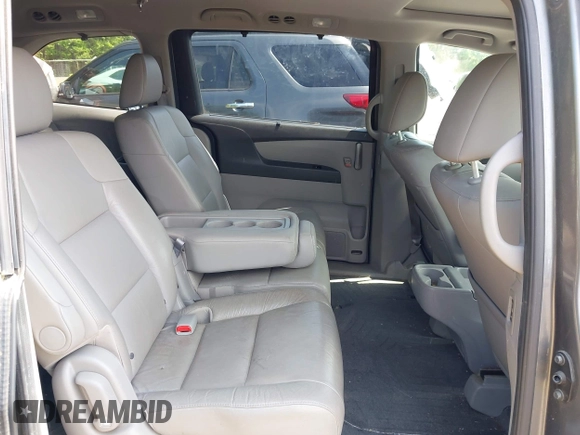 2012 Honda Odyssey EX-L with VIN 5FNRL5H67CB041252, listed as a IAAI auction lot 42158494 with 152,940 mi miles and . Bid and sale history available at DreamBid. Image 8.