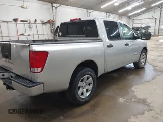 2009 Nissan Titan SE with VIN 1N6BA07D29N304233, listed as a IAAI auction lot 42013084 with 191,407 mi miles. Bid and sale history available at carsss.com. Image 4.