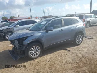 2022 Toyota Corolla Cross LE with VIN 7MUCAAAG0NV018245, listed as a IAAI auction lot 42039762 with 26,690 mi miles and . Bid and sale history available at DreamBid. Image 2.
