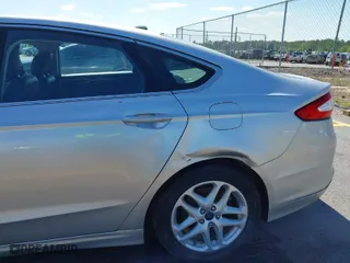 2013 Ford Fusion SE with VIN 3FA6P0HR4DR337047, listed as a IAAI auction lot 41997094 with 195,687 mi miles. Bid and sale history available at carsss.com. Image 6.