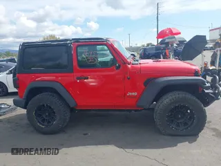 2019 Jeep Wrangler Sport S z VIN 1C4GJXAG4KW652569, wystawiony jako IAAI lot #42116457 z przebiegiem 46 007 mil mil oraz . Historia ofert i sprzedaży dostępna na DreamBid. Obrazek 14.