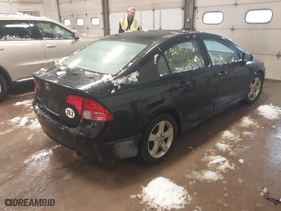 2006 Honda Civic Sdn EX with VIN 1HGFA16806L026147, listed as a IAAI auction lot 41932702 with 215,651 mi miles. Bid and sale history available at carsss.com. Image 4.