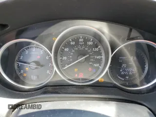 2014 Mazda CX-5 Touring with VIN JM3KE2CY9E0305244, listed as a Copart auction lot 56205605 with 164,516 mi miles and Salvage Title. Bid and sale history available at DreamBid. Image 9.