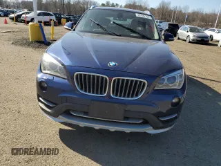2015 BMW X1 xDrive28i with VIN WBAVL1C59FVY31984, listed as a Copart auction lot 49105155 with 135,940 mi miles and Clean Title. Bid and sale history available at carsss.com. Image 5.