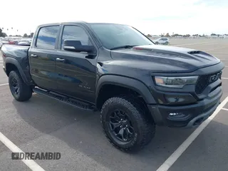 2021 Ram 1500 TRX with VIN 1C6SRFU98MN703355, listed as a IAAI auction lot 40913103 with 27,200 mi miles. Bid and sale history available at carsss.com. Image 1.
