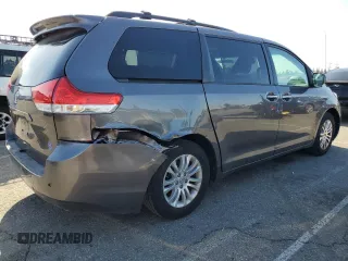 2013 Toyota Sienna XLE AAS with VIN 5TDYK3DC8DS323329, listed as a Copart auction lot 51957005 with 157,638 mi miles and Salvage title. Bid and sale history available at DreamBid. Image 3.