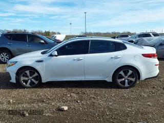 2019 Kia Optima LX with VIN 5XXGT4L31KG334865, listed as a IAAI auction lot 41044256 with 54,717 mi miles. Bid and sale history available at carsss.com. Image 14.