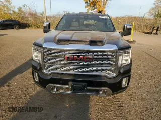 2021 GMC Sierra 3500HD Denali z VIN 1GT49WEY6MF121952, wystawiony jako Copart lot #78447514 z przebiegiem Nie podano mil oraz Szkoda całkowita • Salvage title. Historia ofert i sprzedaży dostępna na DreamBid. Obrazek 5.