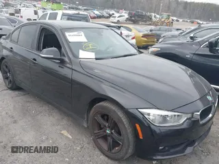 2018 BMW 3 Series 320i with VIN WBA8E1G51JNU91319, listed as a IAAI auction lot 41690084 with 67,609 mi miles. Bid and sale history available at carsss.com. Image 1.