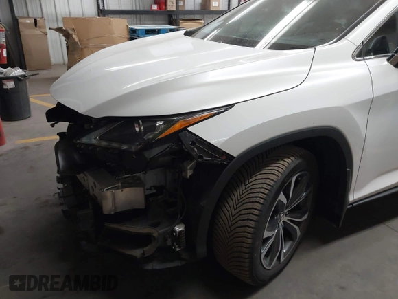 2018 Lexus RX 350L Premium z VIN JTJGZKCA3J2003885, wystawiony jako IAAI lot #42381977 z przebiegiem 76 823 mil mil oraz . Historia ofert i sprzedaży dostępna na DreamBid. Obrazek 6.