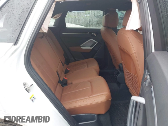 2022 Audi Q3 S line Premium Plus with VIN WA1EECF38N1031860, listed as a IAAI auction lot 42345075 with 27,171 mi miles and . Bid and sale history available at DreamBid. Image 8.
