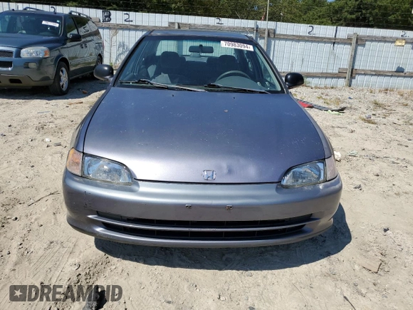 1995 Honda Civic LX z VIN 1HGEG8665SL054389, wystawiony jako Copart lot #70983094 z przebiegiem 195 047 mil mil oraz Szkoda całkowita • Salvage title. Historia ofert i sprzedaży dostępna na DreamBid. Obrazek 5.