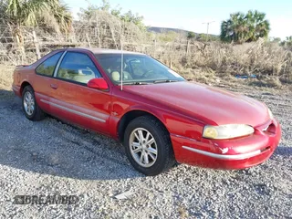 1997 Ford Thunderbird LX with VIN 1FALP62W8VH150725, listed as a IAAI auction lot 41549743 with 106,211 mi miles and . Bid and sale history available at DreamBid. Image 1.