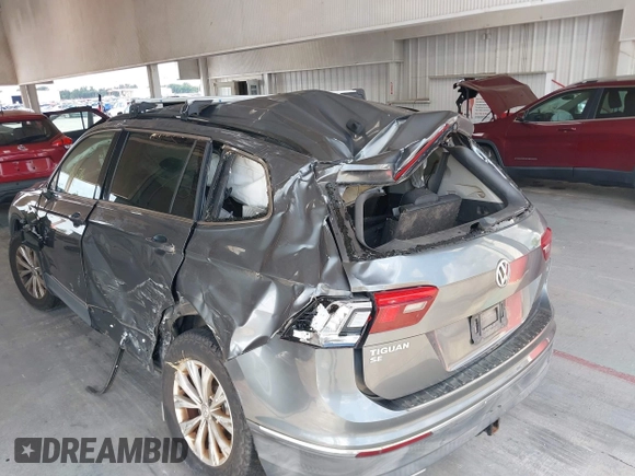 2018 Volkswagen Tiguan SEL with VIN 3VV3B7AXXJM213579, listed as a IAAI auction lot 42664339 with 84,676 mi miles and . Bid and sale history available at DreamBid. Image 6.
