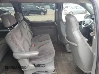1999 Plymouth Voyager Grand SE z VIN 1P4GP44G2XB508599, wystawiony jako Copart lot #43577935 z przebiegiem 136 273 mil mil oraz Szkody całkowita. Historia ofert i sprzedaży dostępna na DreamBid. Obrazek 11.