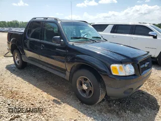 2005 Ford Explorer Sport Trac XLS with VIN 1FMZU67K65UA29830, listed as a Copart auction lot 54941185 with 214,220 mi miles and Salvage title. Bid and sale history available at DreamBid. Image 4.