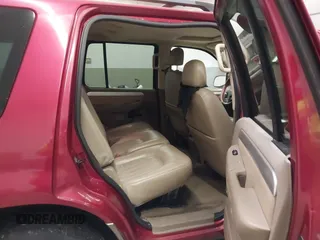 2003 Mercury Mountaineer Convenience z VIN 4M2ZU86K23UJ14446, wystawiony jako IAAI lot #41801753 z przebiegiem 150 629 mil mil oraz . Historia ofert i sprzedaży dostępna na DreamBid. Obrazek 8.