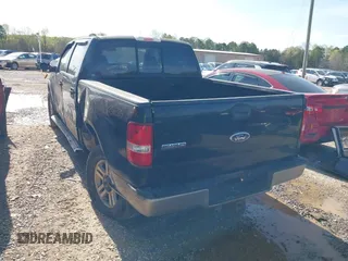 2005 Ford F-150 XLT with VIN 1FTPW14515KD71446, listed as a IAAI auction lot 41910372 with 113,725 mi miles. Bid and sale history available at carsss.com. Image 3.