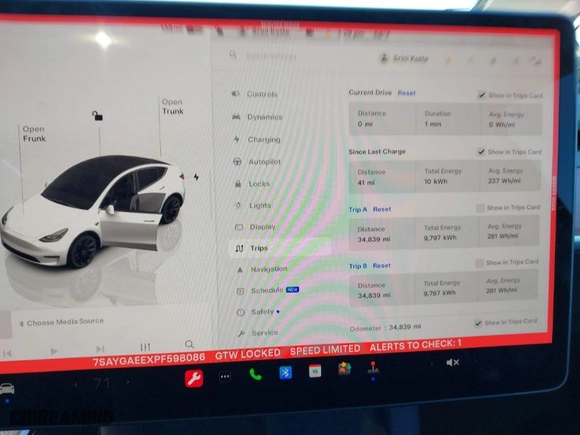 2023 Tesla Model Y Long Range with VIN 7SAYGAEEXPF598086, listed as a IAAI auction lot 41125984 with NaN miles. Bid and sale history available at carsss.com. Image 7.