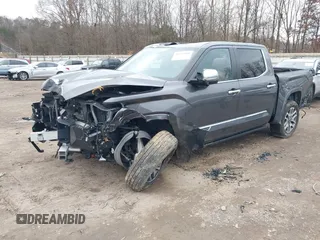 2024 Toyota Tundra 1794 Edition with VIN 5TFMA5DBXRX142402, listed as a IAAI auction lot 41253806 with 17,523 mi miles and . Bid and sale history available at DreamBid. Image 16.