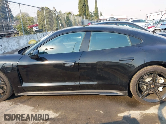 2022 Porsche Taycan z VIN WP0AA2Y10NSA11640, wystawiony jako IAAI lot #41215410 z przebiegiem 25 749 mil mil oraz . Historia ofert i sprzedaży dostępna na DreamBid. Obrazek 14.