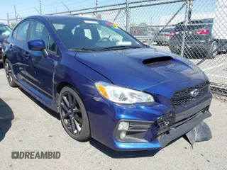 2021 Subaru WRX Premium with VIN JF1VA1C63M9814059, listed as a IAAI auction lot 42039228 with 87,437 mi miles. Bid and sale history available at carsss.com. Image 1.