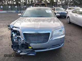 2014 Chrysler 300 C with VIN 2C3CCAKG9EH201407, listed as a IAAI auction lot 41658245 with 95,891 mi miles and . Bid and sale history available at carsss.com. Image 12.