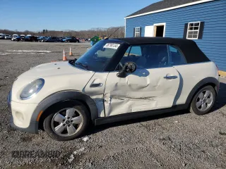 2016 MINI Convertible with VIN WMWWG5C5XG3C19552, listed as a Copart auction lot 86790134 with 112,494 mi miles and Salvage Title. Bid and sale history available at DreamBid. Image 1.