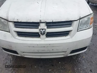 2009 Dodge Grand Caravan SE z VIN 2D8HN44E59R686932, wystawiony jako IAAI lot #41980994 z przebiegiem Nie podano mil oraz . Historia ofert i sprzedaży dostępna na DreamBid. Obrazek 6.