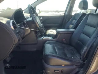 2005 Ford Freestyle Limited z VIN 1FMDK06165GA16290, wystawiony jako Copart lot #55596965 z przebiegiem Nie podano mil oraz Szkoda całkowita • Salvage title. Historia ofert i sprzedaży dostępna na DreamBid. Obrazek 7.