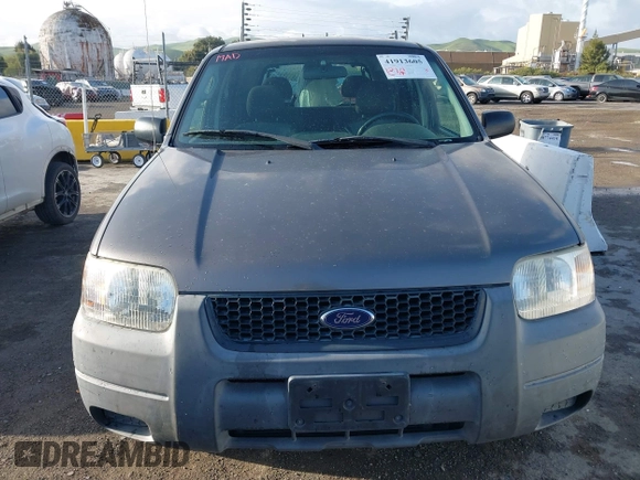 2004 Ford Escape with VIN 1FMCU02174KA61956, listed as a IAAI auction lot 41913605 with 166,587 mi miles and . Bid and sale history available at DreamBid. Image 6.