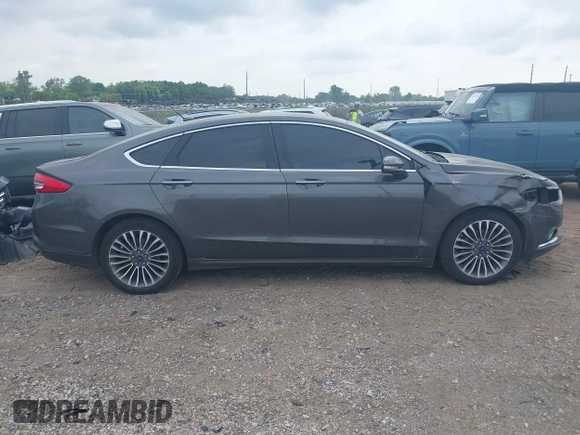 2017 Ford Fusion SE with VIN 3FA6P0T9XHR186017, listed as a IAAI auction lot 42535725 with 166,794 mi miles and . Bid and sale history available at DreamBid. Image 13.