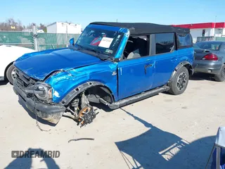 2022 Ford Bronco with VIN 1FMDE5BHXNLB00725, listed as a IAAI auction lot 41672345 with 46,569 mi miles. Bid and sale history available at carsss.com. Image 2.