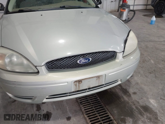 2004 Ford Taurus SES with VIN 1FAFP55244A165584, listed as a IAAI auction lot 42142288 with 133,339 mi miles and . Bid and sale history available at DreamBid. Image 6.
