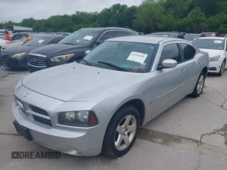 2010 Dodge Charger SXT with VIN 2B3CA3CV2AH227658, listed as a IAAI auction lot 42101656 with 162,392 mi miles. Bid and sale history available at carsss.com. Image 2.