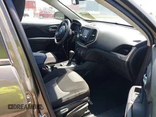 2015 Jeep Cherokee Sport with VIN 1C4PJMAB9FW595102, listed as a IAAI auction lot 42257918 with 95,059 mi miles and . Bid and sale history available at DreamBid. Image 5.
