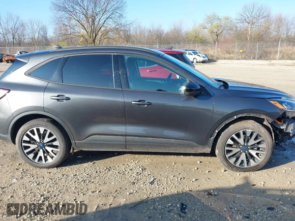 2020 Ford Escape SE Sport Hybrid with VIN 1FMCU9BZ3LUC23532, listed as a IAAI auction lot 40749554 with 96,291 mi miles and . Bid and sale history available at DreamBid. Image 14.