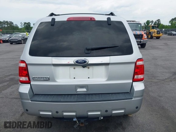 2010 Ford Escape Limited z VIN 1FMCU0E72AKD30702, wystawiony jako IAAI lot #42093802 z przebiegiem 155 572 mil mil oraz . Historia ofert i sprzedaży dostępna na DreamBid. Obrazek 16.
