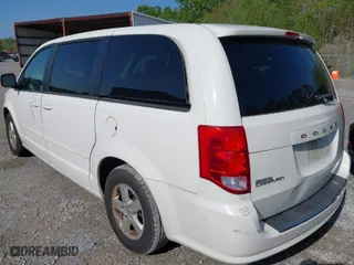 2013 Dodge Grand Caravan SXT with VIN 2C4RDGCG3DR537051, listed as a IAAI auction lot 41919188 with 180,524 mi miles. Bid and sale history available at carsss.com. Image 3.