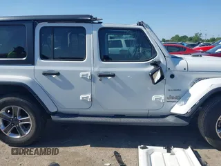 2019 Jeep Wrangler Unlimited Sahara with VIN 1C4HJXEG0KW577917, listed as a IAAI auction lot 41993670 with 90,584 mi miles and . Bid and sale history available at DreamBid. Image 13.