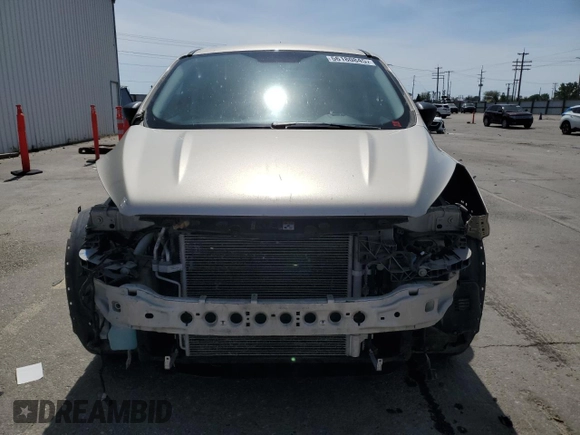 2017 Ford Escape S with VIN 1FMCU0F77HUE25995, listed as a Copart auction lot 56180845 with 105,006 mi miles and Salvage title. Bid and sale history available at DreamBid. Image 5.