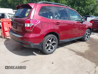 2014 Subaru Forester XT Touring with VIN JF2SJGMC9EH552996, listed as a IAAI auction lot 42540898 with 145,932 mi miles and . Bid and sale history available at DreamBid. Image 4.