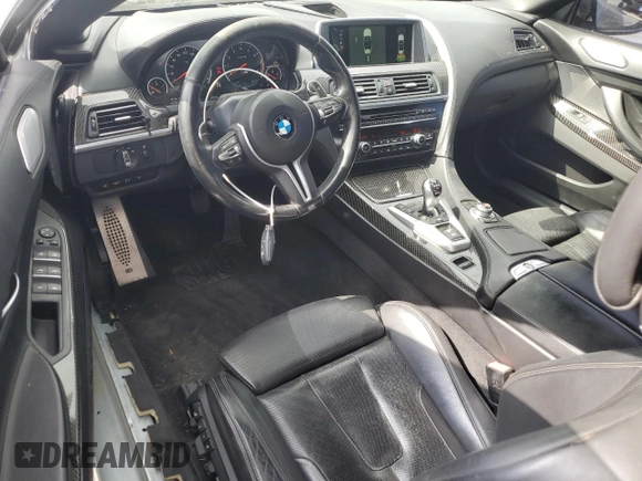 2014 BMW M6 z VIN WBSLZ9C50EDZ78344, wystawiony jako Copart lot #54719265 z przebiegiem 59 556 mil mil oraz Szkoda całkowita • Salvage title. Historia ofert i sprzedaży dostępna na DreamBid. Obrazek 8.