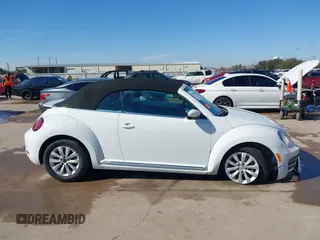 2019 Volkswagen Beetle S with VIN 3VW5DAAT0KM507437, listed as a IAAI auction lot 41380821 with 28,010 mi miles and . Bid and sale history available at DreamBid. Image 13.