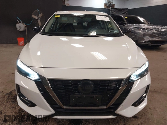 2021 Nissan Sentra SR z VIN 3N1AB8DVXMY320878, wystawiony jako IAAI lot #41911623 z przebiegiem 13 134 mil mil oraz . Historia ofert i sprzedaży dostępna na DreamBid. Obrazek 12.
