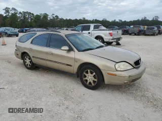 2001 Mercury Sable LS Premium z VIN 1MEFM59S11A639790, wystawiony jako Copart lot #79476074 z przebiegiem 96 496 mil mil oraz Szkody całkowita. Historia ofert i sprzedaży dostępna na DreamBid. Obrazek 4.